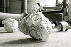 A crumpled piece of paper with writing on it