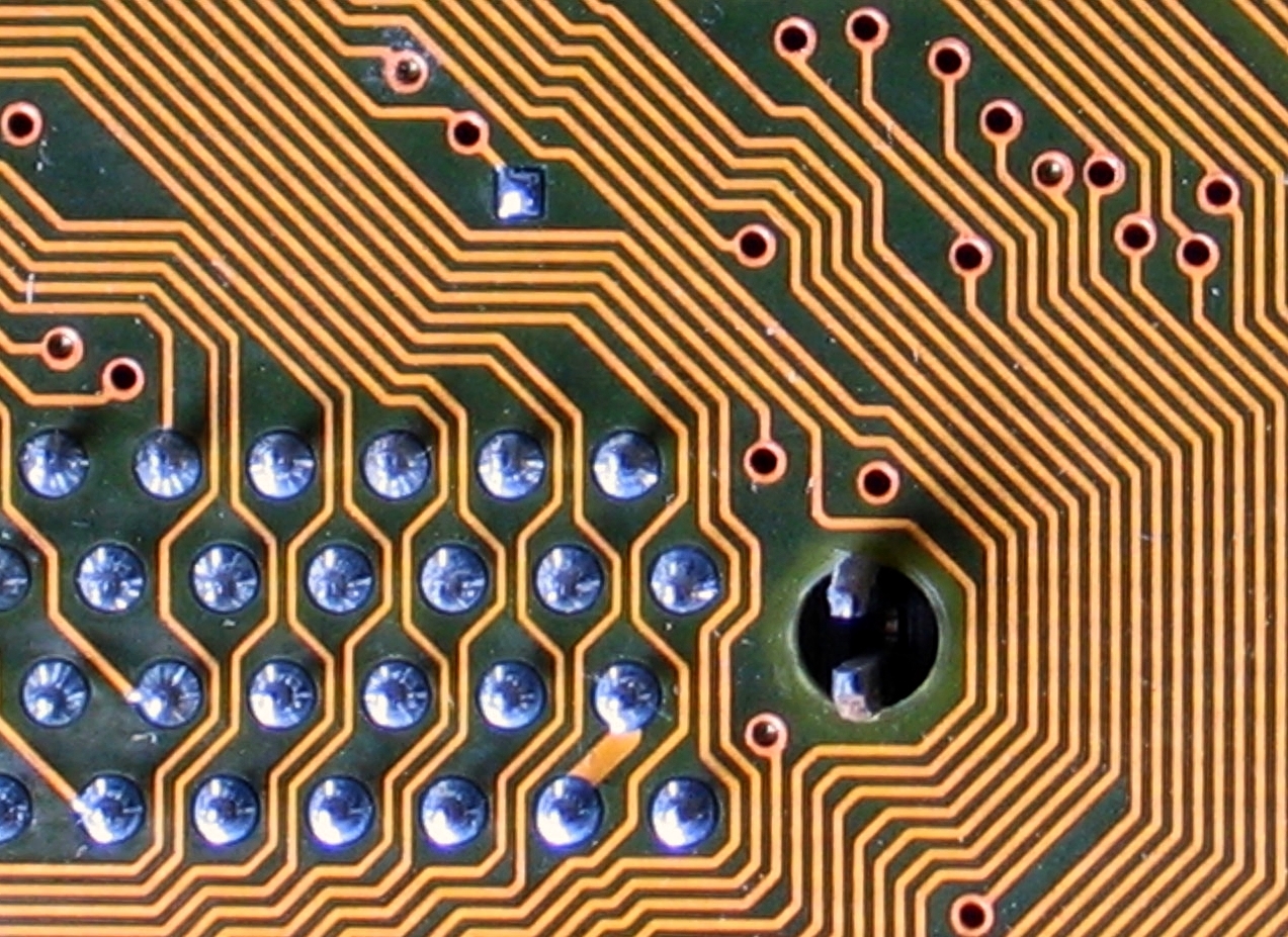 Labyrinthine circuit board lines by Karl-Ludwig Poggemann on Flickr, used under (CC BY 2.0)